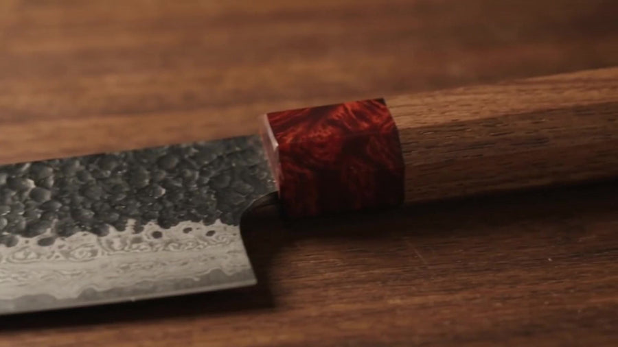 Hammered Tsuchime finish and red resin collar on the Kuroshio blade