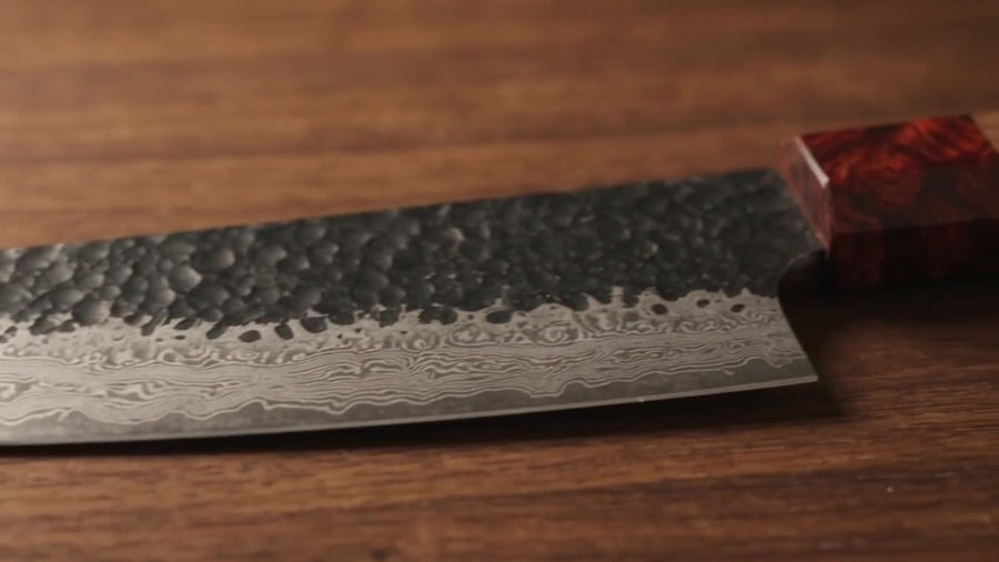 Close-up of the Damascus ripple pattern on the Kuroshio blade